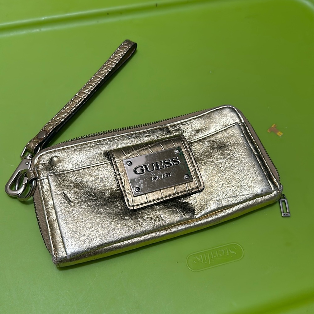 GUESS small gold wristlet